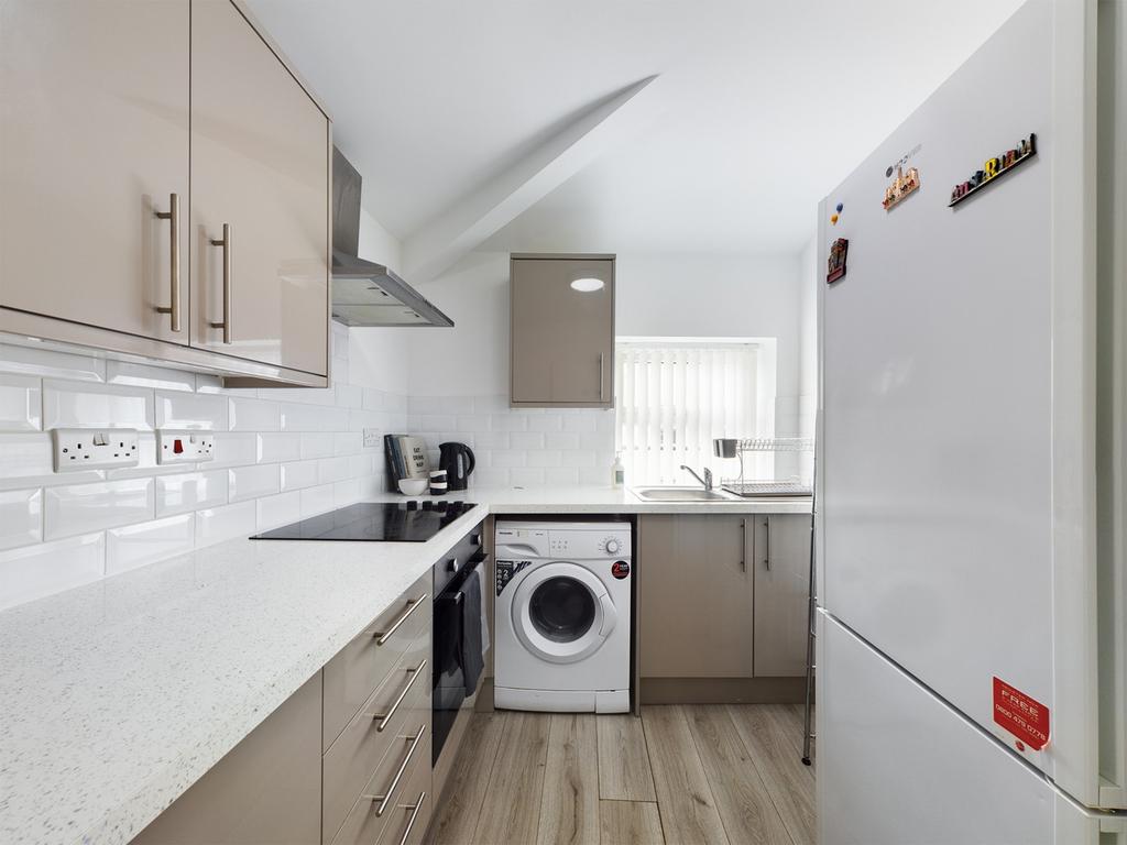 A modern and well-maintained kitchenette with s...