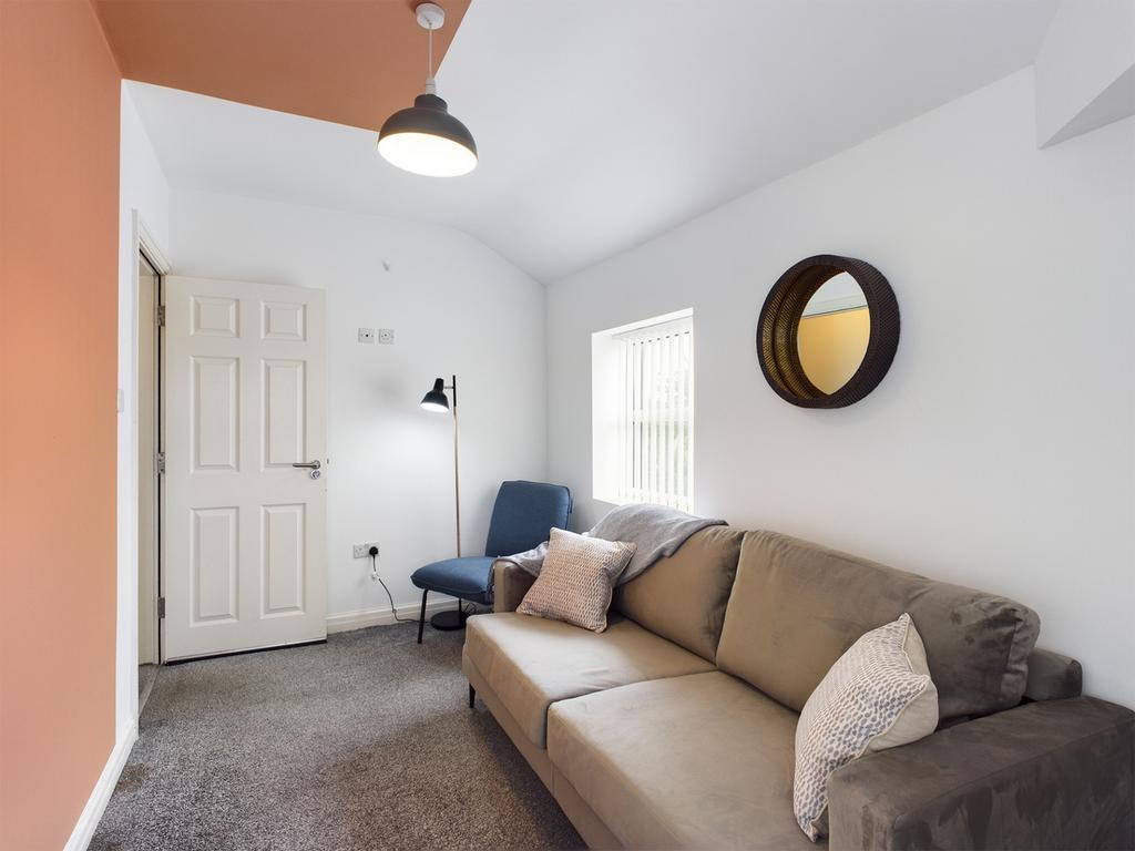 A bright and inviting living room perfect for r...
