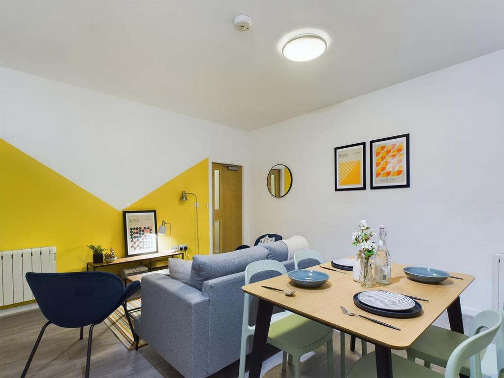A bright and inviting large modern living room ...