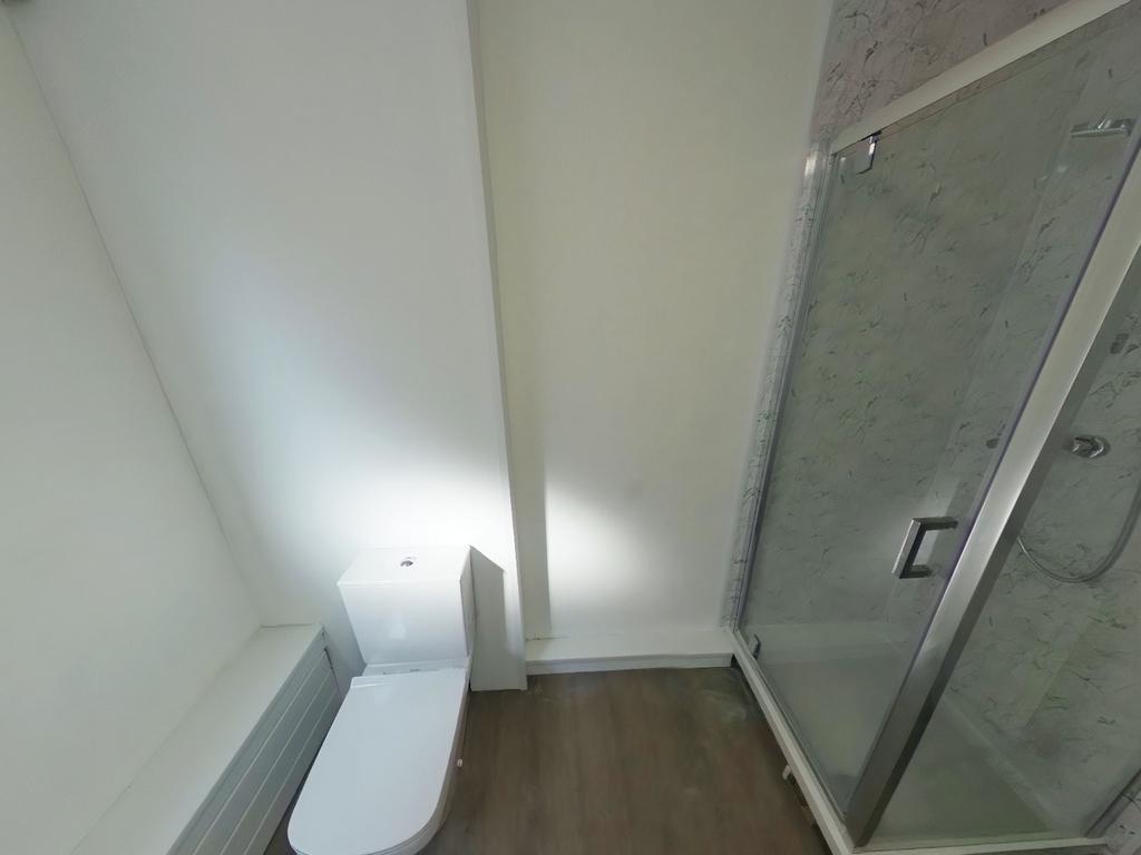 A bright and modern bathroom featuring a stylis...