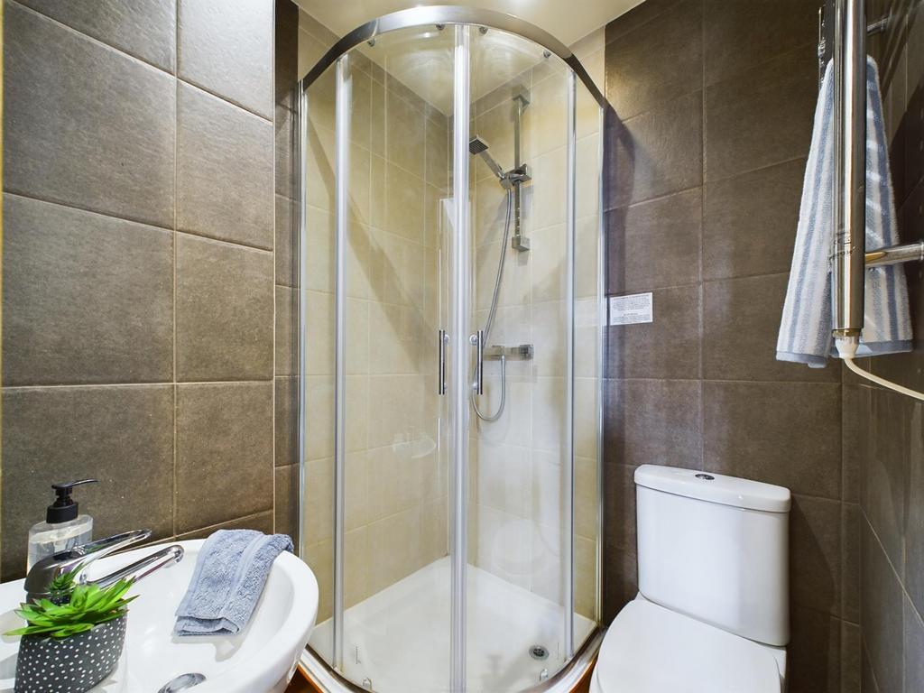 A modern and clean bathroom featuring a stylish...
