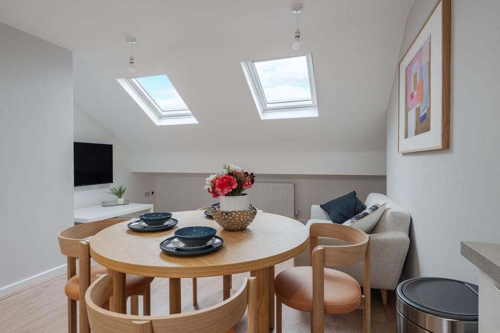 Bright and contemporary living room with large ...