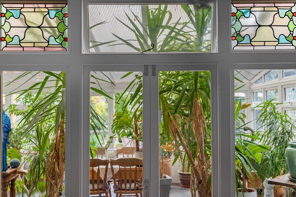 Doors into conservatory