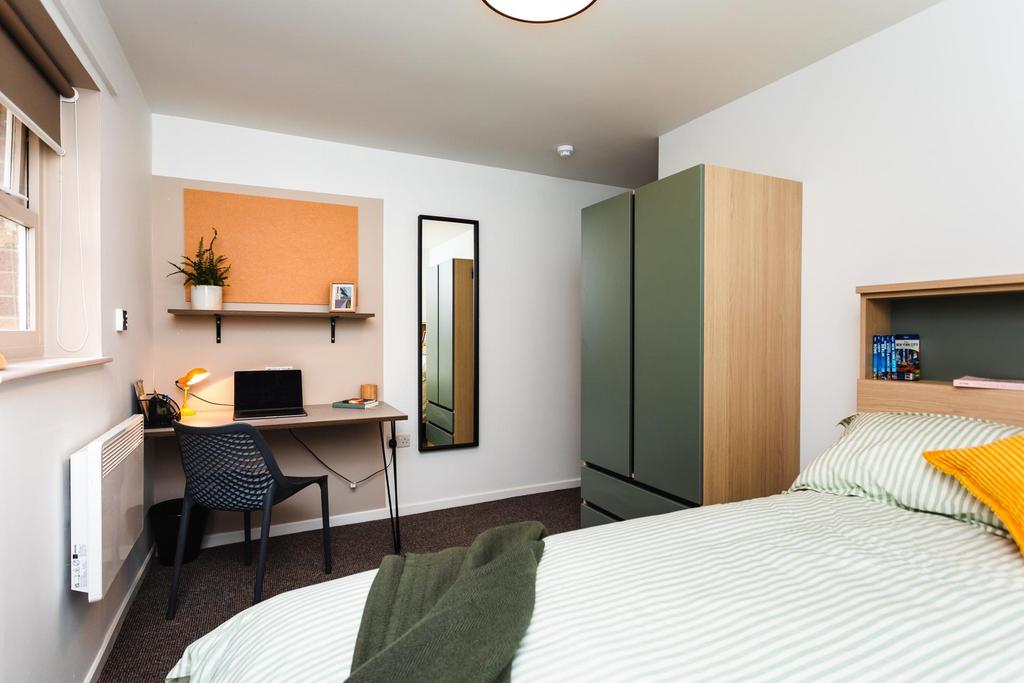 Bright, neatly presented single bedroom with a ...