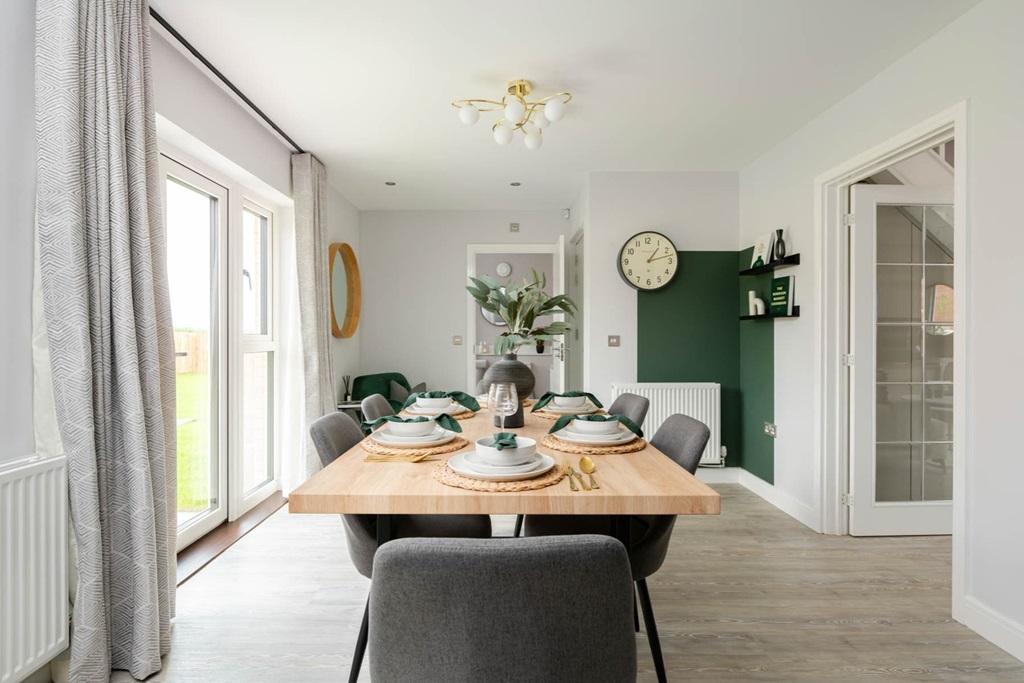 A modern kitchen & dining area with ample storage