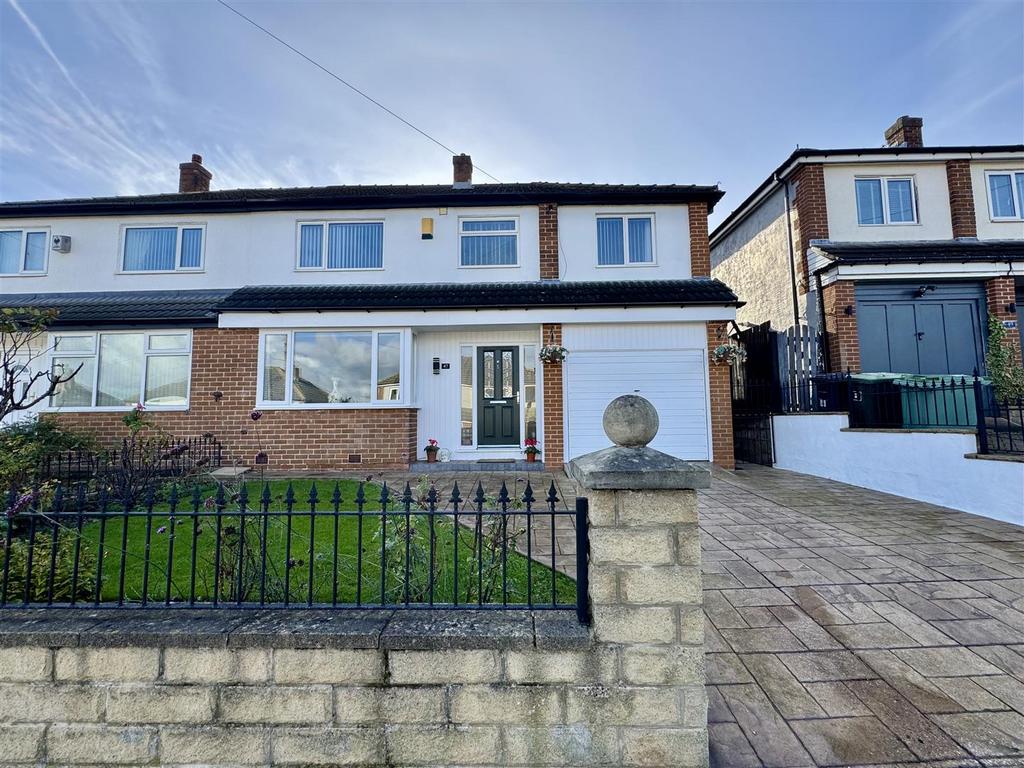 External front, garage and driveway
