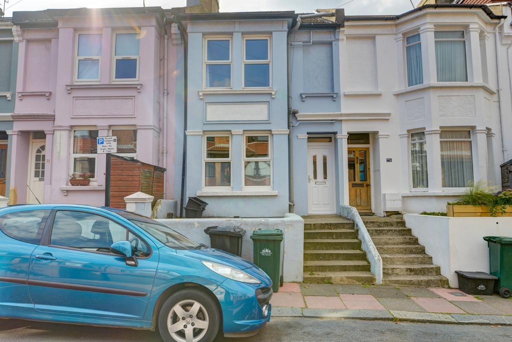 Exterior shot of a charming terraced house with...