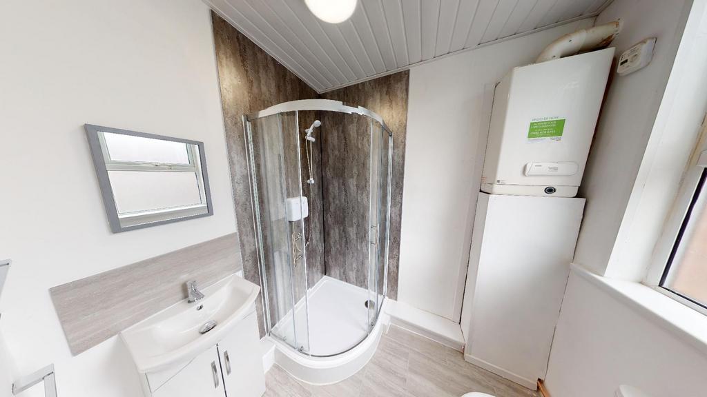 A modern, well-maintained bathroom featuring a ...
