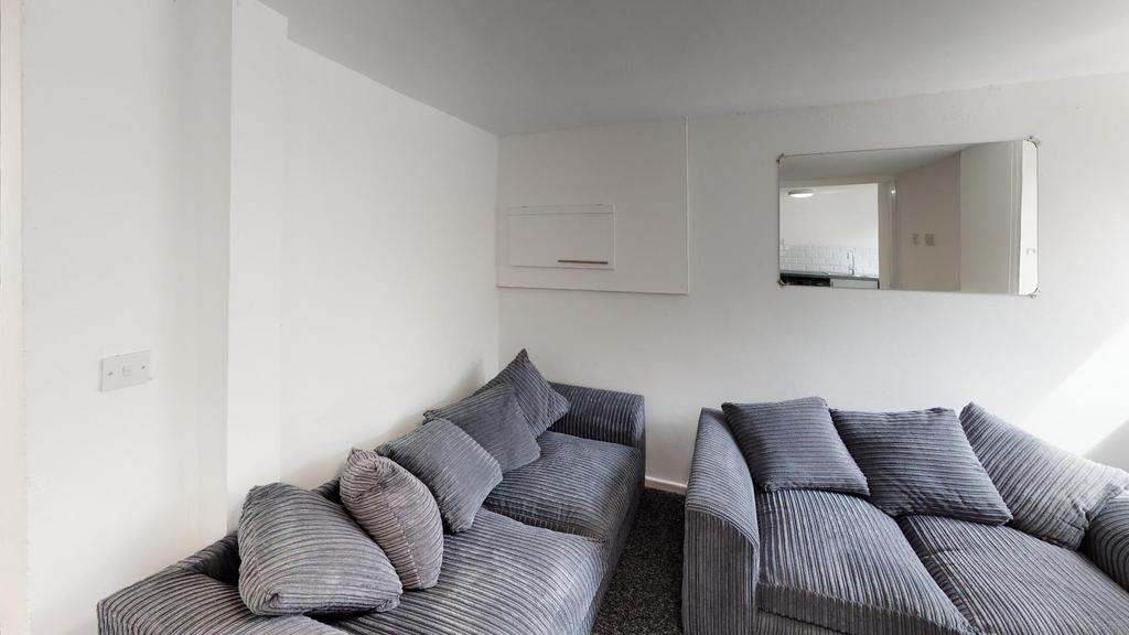 Bright and welcoming contemporary living room f...