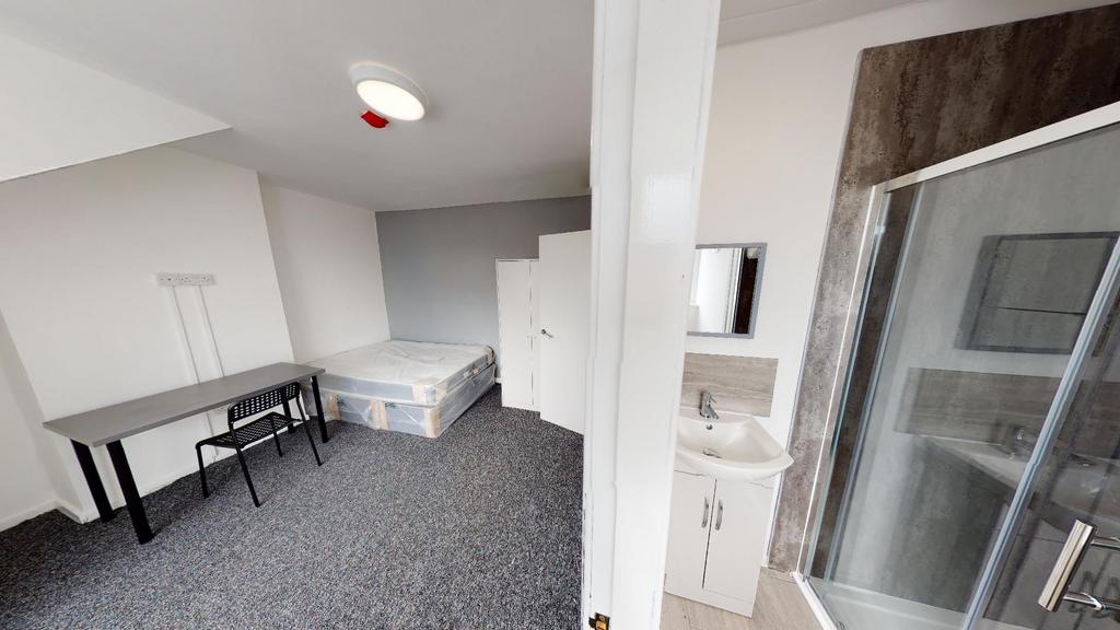A clean and well-maintained bathroom with natur...