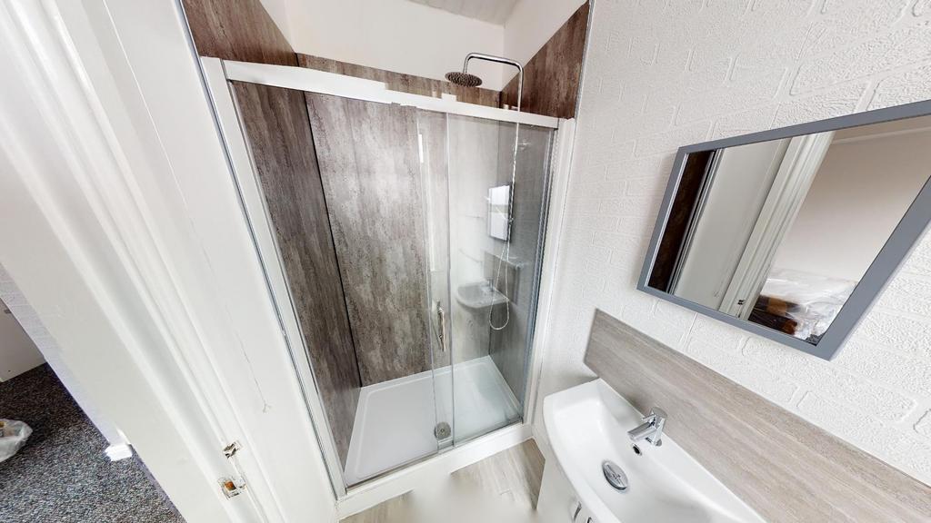 A clean and well-maintained bathroom featuring ...