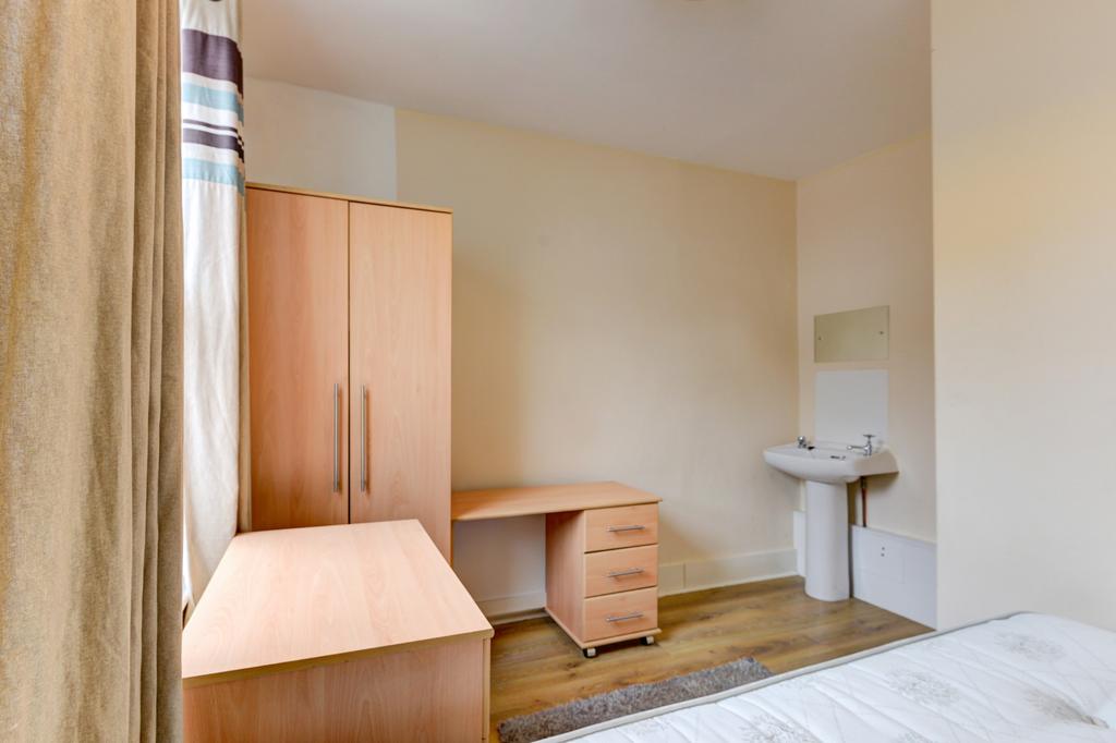 A clean and well-maintained bathroom featuring ...