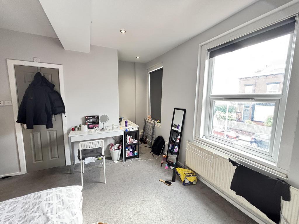 A bright and well-maintained living room with l...