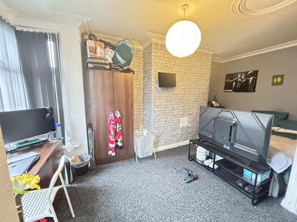 A contemporary living room with a cozy atmosphe...