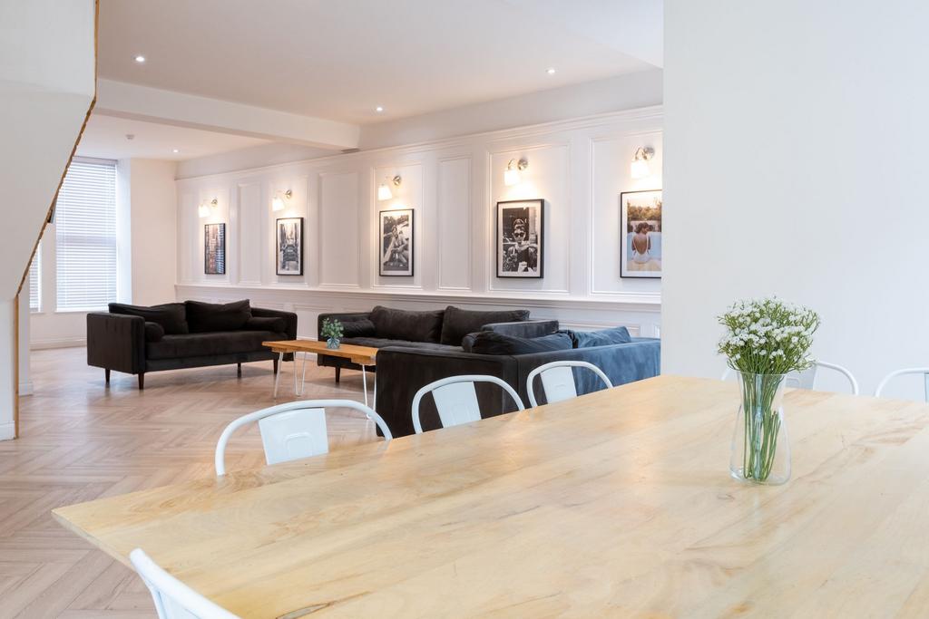 A spacious and bright living room featuring mod...