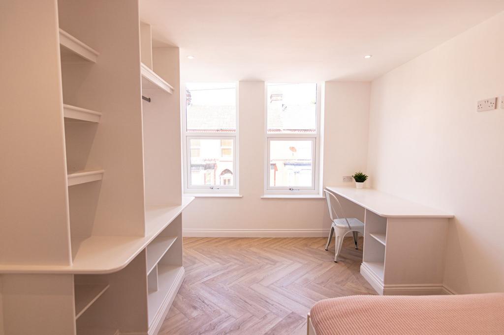 Bright and airy study area with large windows p...