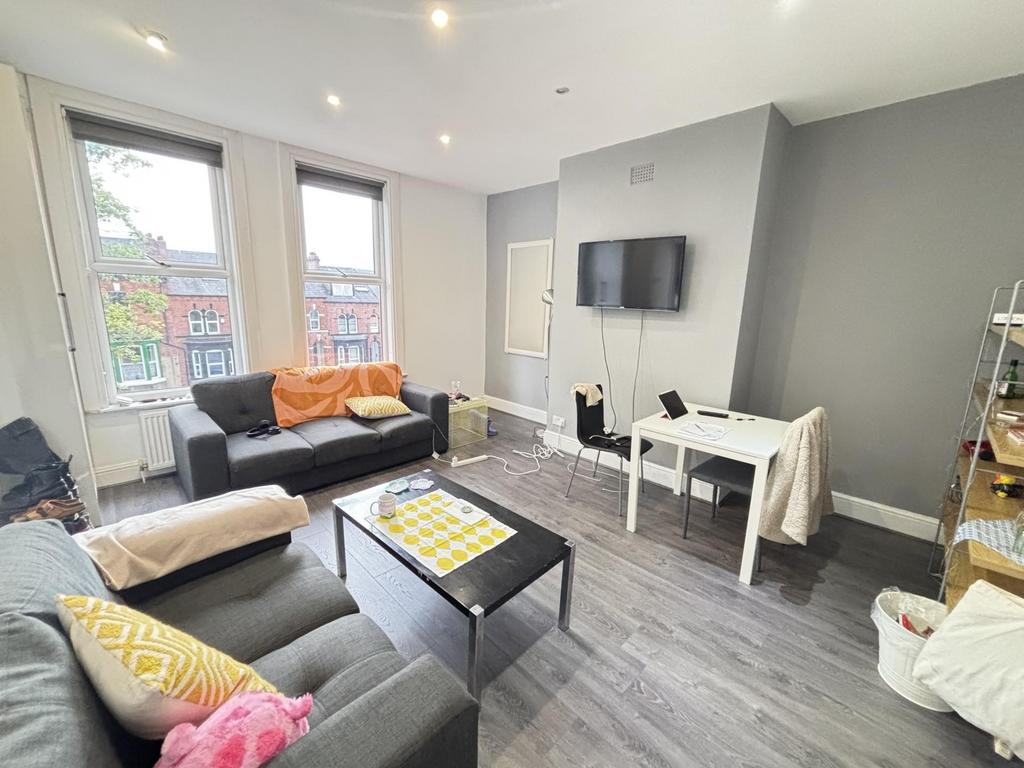A modern and inviting living room featuring com...
