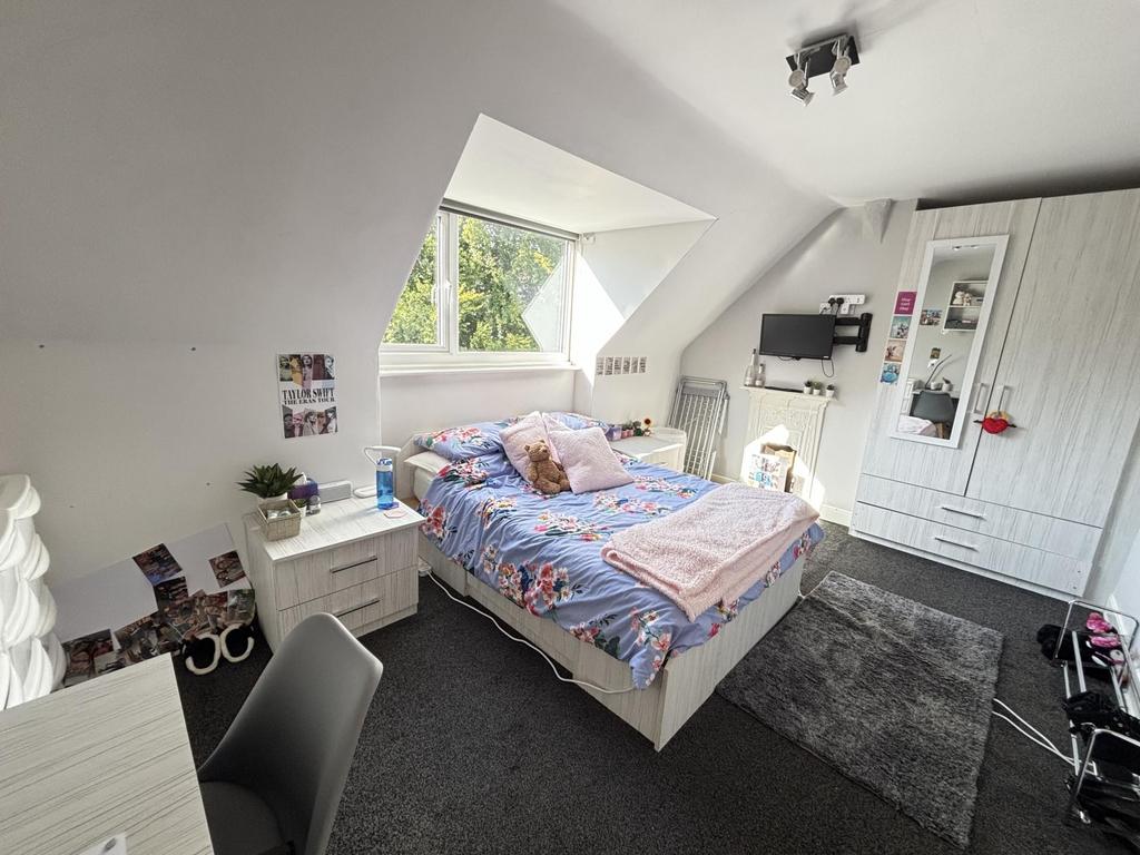 Bright and inviting double bedroom featuring a ...