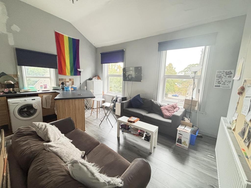 Bright and spacious living room featuring moder...