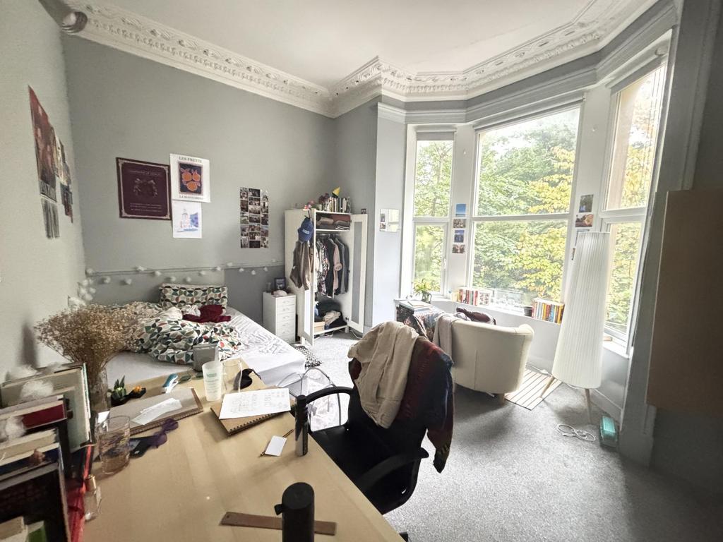 Bright and airy living room with large windows ...