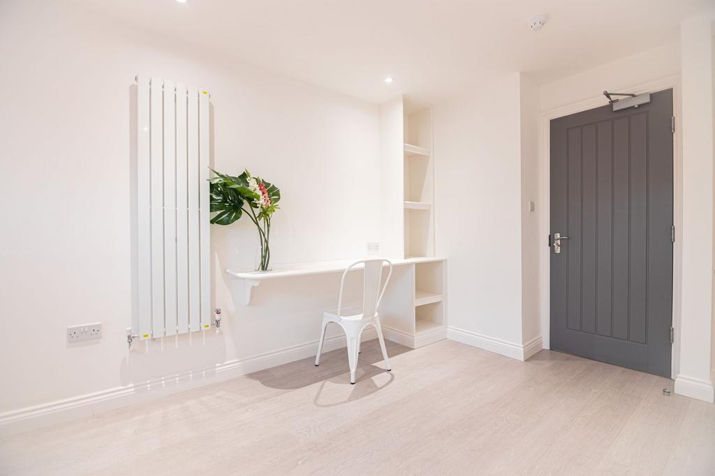Bright, minimalist study corner with a built-in...