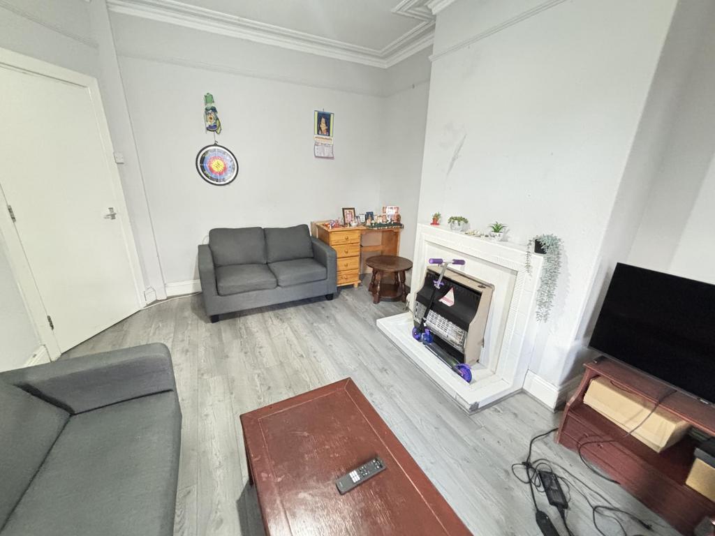 A spacious and inviting contemporary living roo...