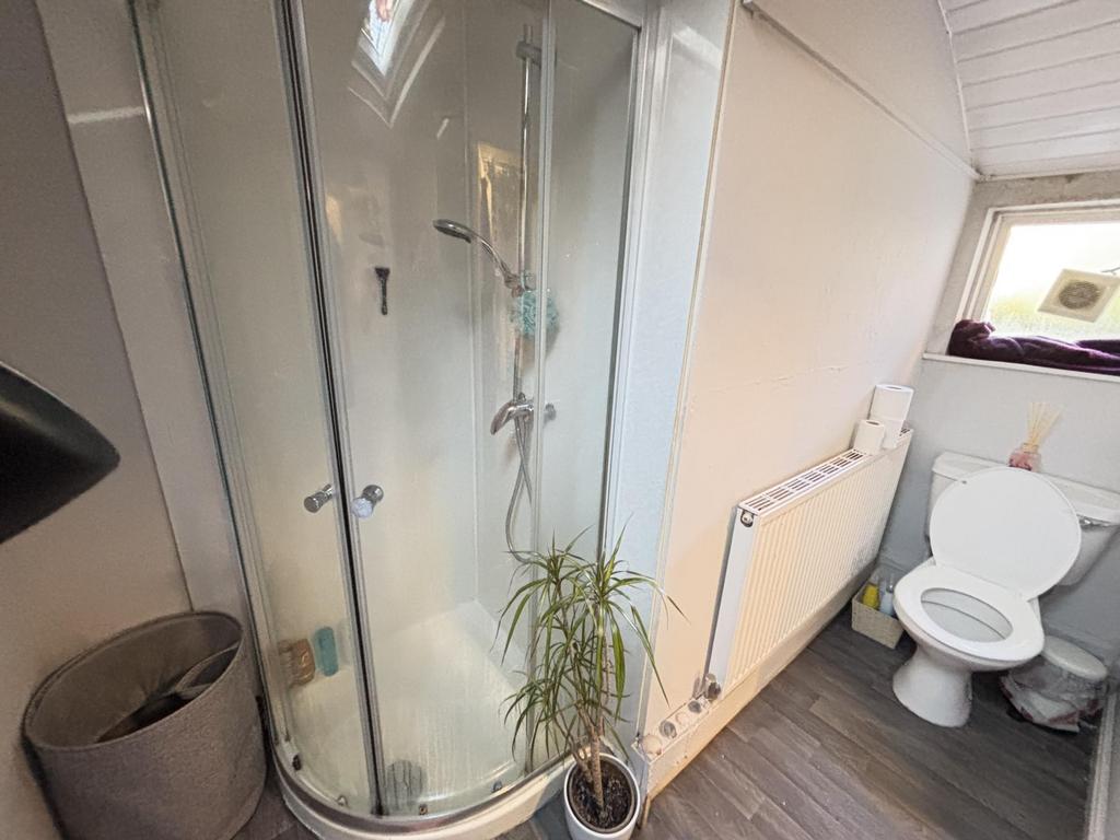 A clean and well-maintained bathroom featuring ...