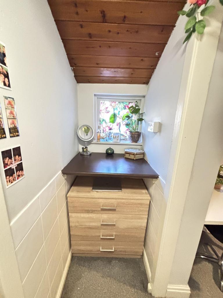 A bright and clean bathroom featuring a window ...