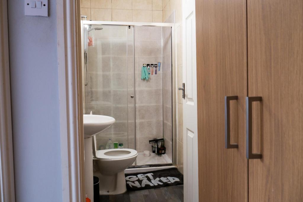 A clean and well-maintained bathroom with a toi...