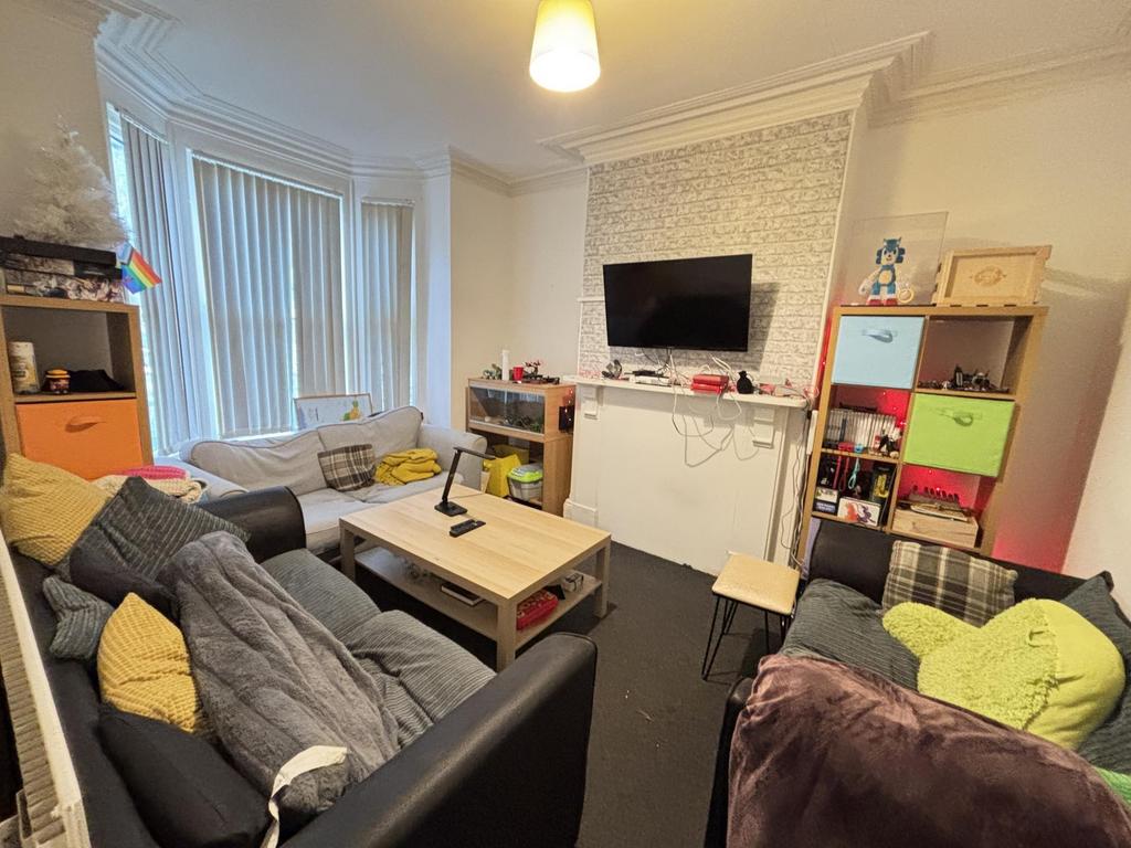 A cozy living room featuring comfortable seatin...