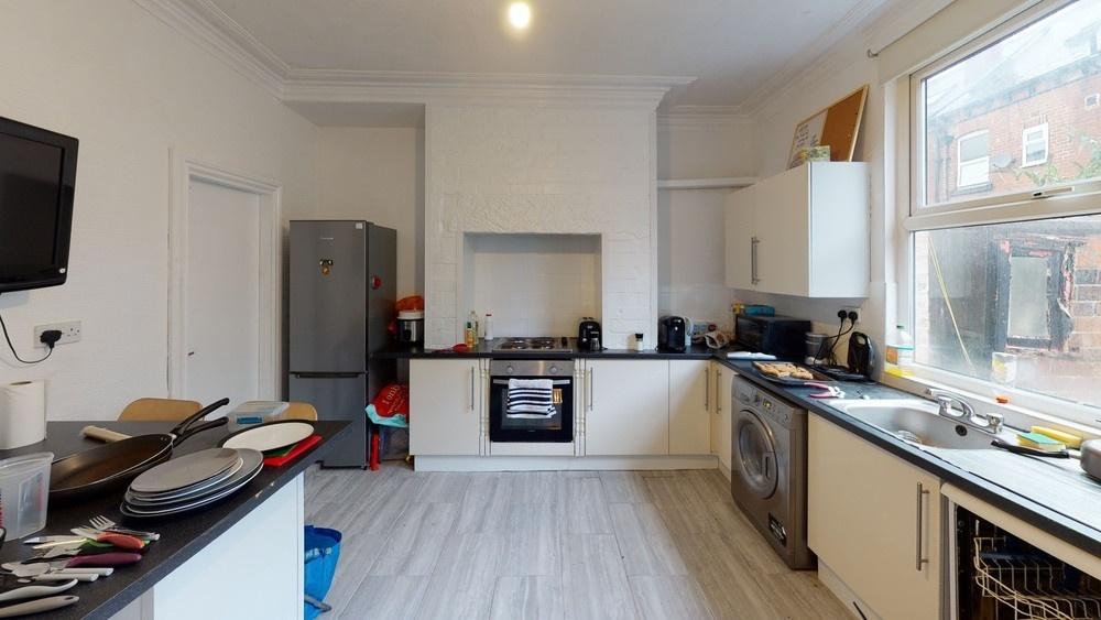 Bright and well-lit kitchen featuring modern ap...