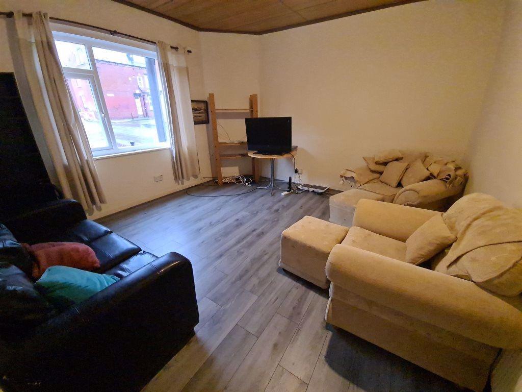 A cozy living room featuring comfortable sofas ...