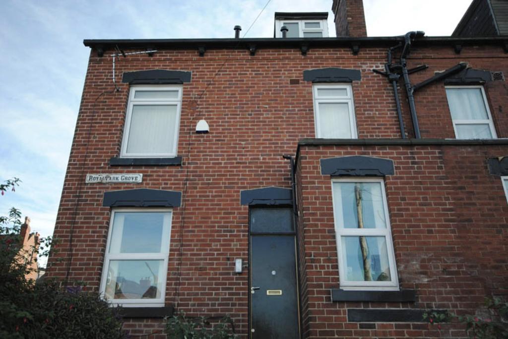 A charming brick-front exterior of a residentia...