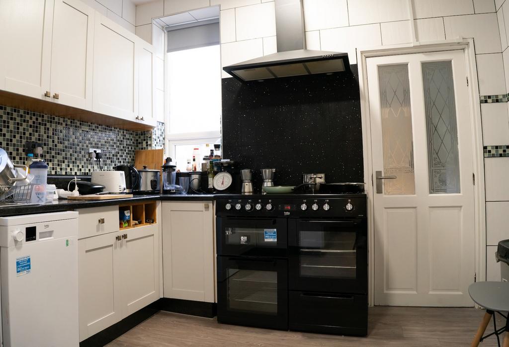 A cozy and functional kitchenette with modern a...