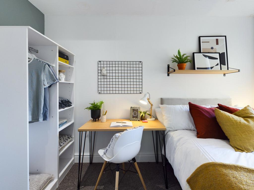 A stylish and inviting double bedroom featuring...