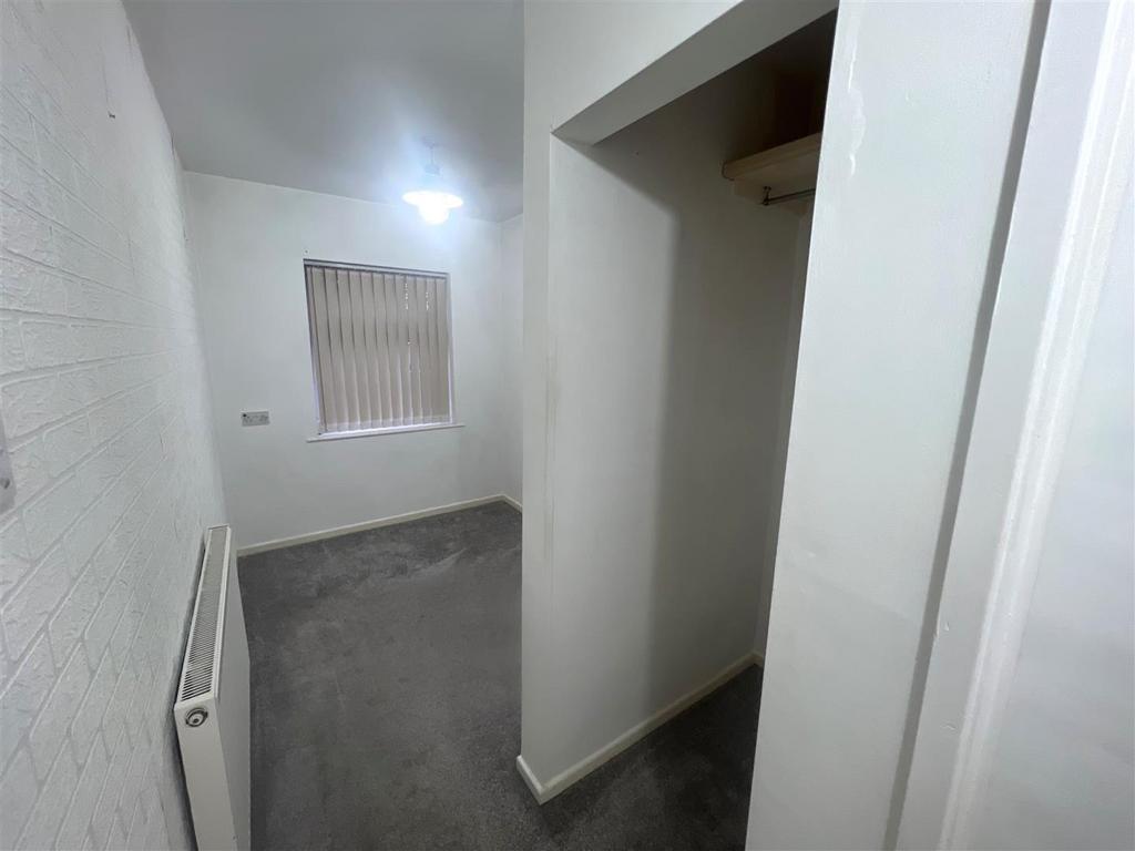 BEDROOM 2 WITH DRESISNG SPACE.jpg