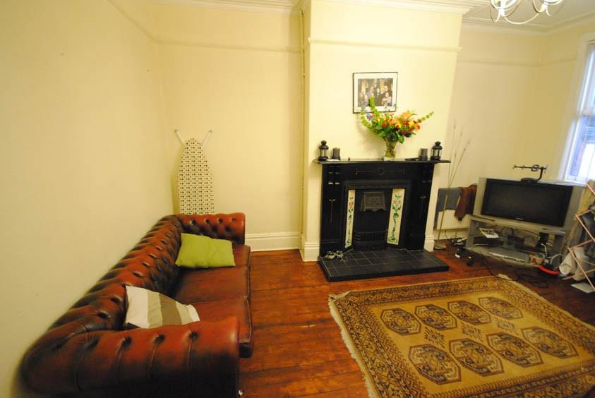 Bright and inviting living room featuring a com...