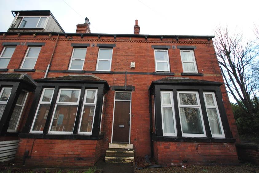 A charming traditional brick-fronted house with...
