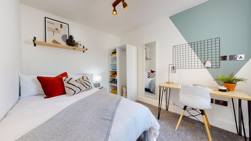 A stylish and inviting double bedroom perfect f...