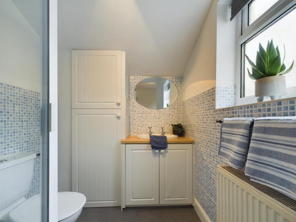 A bright and modern bathroom featuring stylish ...