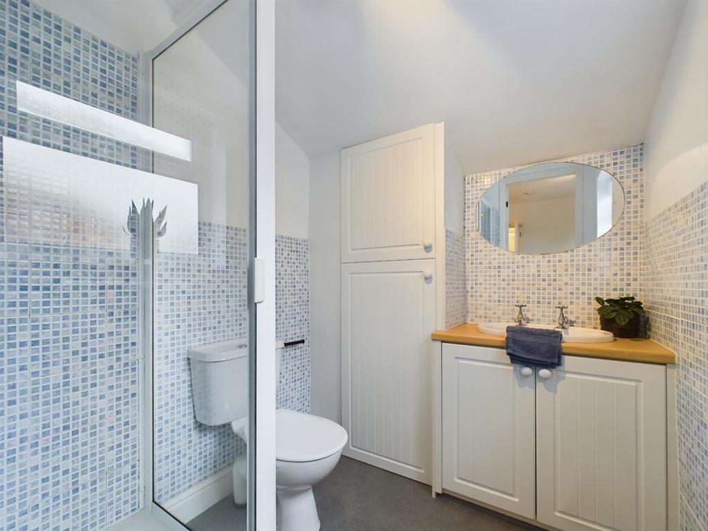 A bright and modern bathroom featuring stylish ...