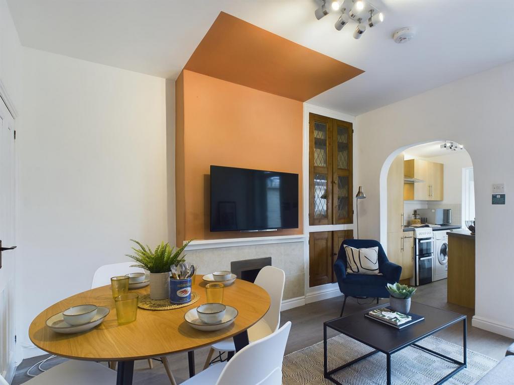 A spacious and modern living room perfect for s...
