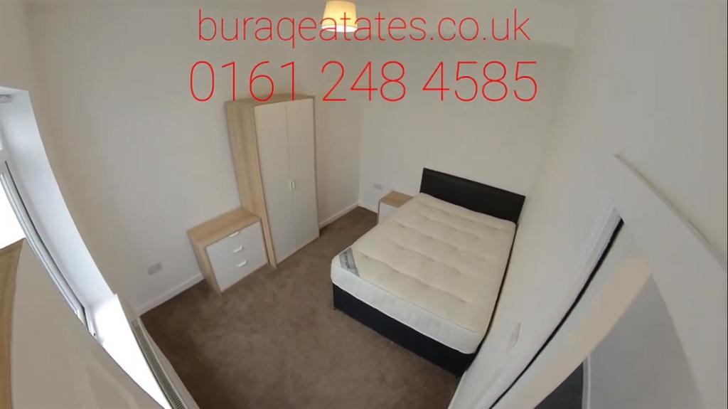 Bright, simply furnished double bedroom with ne...