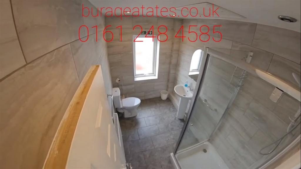 Bright, modern bathroom with a walk-in shower, ...