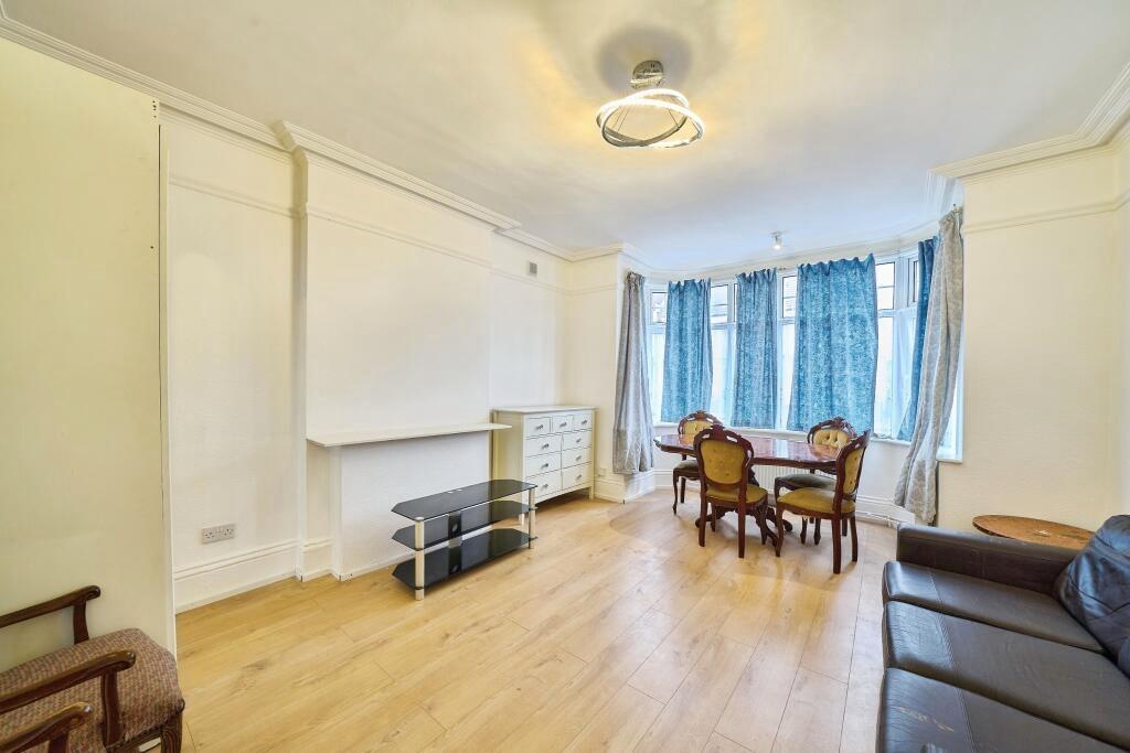 Bright, well-presented living room with wood fl...