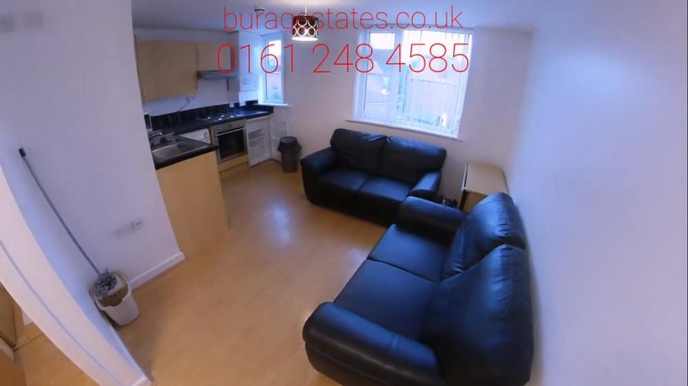 Bright open-plan living area with a compact fit...