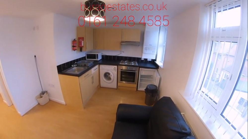 Bright open-plan living area with a compact fit...