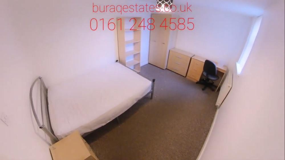 Bright, simply furnished double bedroom with a ...