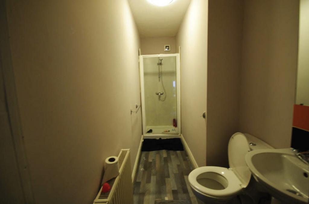 A modern, well-maintained bathroom with a toile...