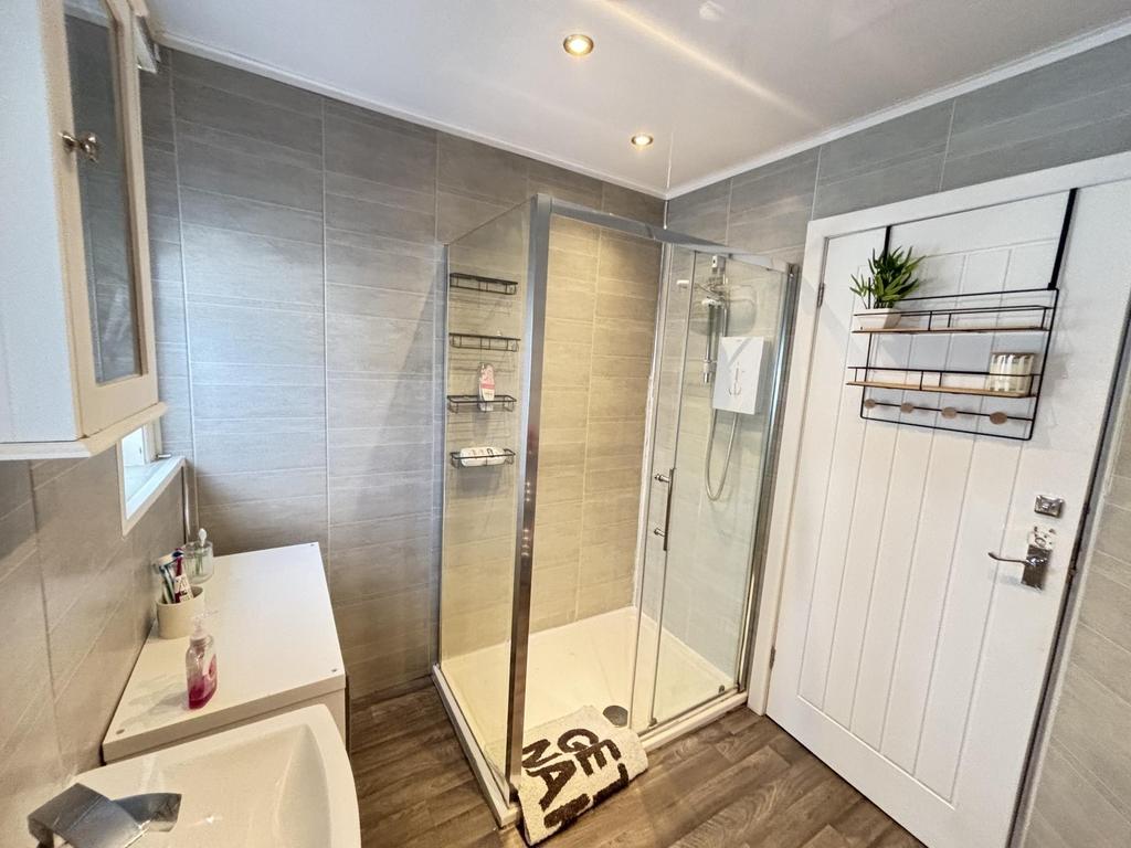 A modern and well-maintained bathroom featuring...